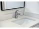 Modern bathroom vanity with quartz countertop and chrome faucet at 2133 Selover Rd, North Port, FL 34287