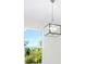 Modern chandelier in a bright dining room at 2133 Selover Rd, North Port, FL 34287