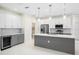 Modern kitchen with stainless steel appliances and an island at 2133 Selover Rd, North Port, FL 34287