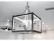 Modern chandelier in a bright kitchen area at 2133 Selover Rd, North Port, FL 34287