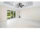 Living room with sliding doors leading to the backyard at 2133 Selover Rd, North Port, FL 34287