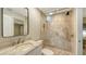 Modern bathroom with frameless shower and updated vanity at 2195 Harbourside Dr # 404, Longboat Key, FL 34228