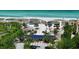 Beach club, parking lot, beach access, and walkway at 2195 Harbourside Dr # 404, Longboat Key, FL 34228