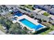 Community pool with lounge chairs and shade at 2195 Harbourside Dr # 404, Longboat Key, FL 34228