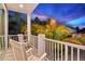 Peaceful balcony with rocking chairs and beautiful sunset view at 2213 Avenue B, Bradenton Beach, FL 34217