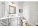 Bathroom with gray vanity and patterned floor tiles at 2213 Avenue B, Bradenton Beach, FL 34217