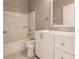 Bathroom with a white vanity and shower/tub combo at 22419 Bette Ave, Port Charlotte, FL 33954