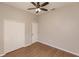 Bedroom with double doors and wood flooring at 22419 Bette Ave, Port Charlotte, FL 33954