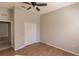 Spacious bedroom with wood floors and double door closet at 22419 Bette Ave, Port Charlotte, FL 33954