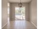 Dining room with sliding glass doors leading to the pool at 22419 Bette Ave, Port Charlotte, FL 33954