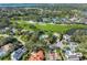 Aerial view of house and golf course community at 227 Saint James Park, Osprey, FL 34229