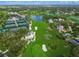 Aerial view of community with tennis courts and golf course at 227 Saint James Park, Osprey, FL 34229