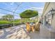 Covered patio perfect for outdoor dining and relaxation at 227 Saint James Park, Osprey, FL 34229