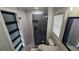 Contemporary bathroom with a frameless shower and gray tile at 3001 Seasons Blvd, Sarasota, FL 34240