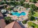 Aerial view of a large community pool and surrounding area at 314 Mystic Falls Dr, Apollo Beach, FL 33572