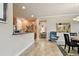 Open dining area with view into kitchen and living room at 314 Mystic Falls Dr, Apollo Beach, FL 33572