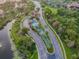 Ornate entrance to community with water features at 314 Mystic Falls Dr, Apollo Beach, FL 33572