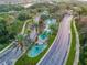 Gated entrance with water features and landscaping at 314 Mystic Falls Dr, Apollo Beach, FL 33572