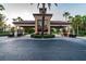 Gated community entrance with guard house at 314 Mystic Falls Dr, Apollo Beach, FL 33572