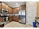 Well-equipped kitchen featuring stainless steel appliances at 314 Mystic Falls Dr, Apollo Beach, FL 33572