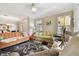 Open living room showcasing a neutral color palette and comfortable seating arrangement at 314 Mystic Falls Dr, Apollo Beach, FL 33572