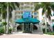 Condo building entrance with palm trees and stairs at 340 S Palm Ave # 45, Sarasota, FL 34236