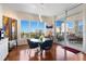 Bright dining area with city views and glass table at 340 S Palm Ave # 45, Sarasota, FL 34236