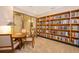 Well-lit library with ample bookshelves and seating area at 340 S Palm Ave # 45, Sarasota, FL 34236