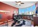 Home office with built-in bookshelves and city views at 340 S Palm Ave # 45, Sarasota, FL 34236