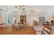 Elegant dining room showcasing a wooden table and decorative centerpieces at 3465 Winding Oaks Dr # 33, Longboat Key, FL 34228