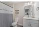 Clean bathroom with white vanity and a shower/tub combo at 3623 Giblin Dr, North Port, FL 34286