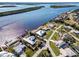 Aerial view showing waterfront property with homes and boat docks at 3662 Peace River Dr, Punta Gorda, FL 33983