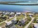 Aerial view of waterfront homes with private docks and lush landscaping at 3662 Peace River Dr, Punta Gorda, FL 33983