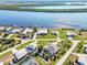 Aerial view of waterfront homes with private docks and lush landscaping at 3662 Peace River Dr, Punta Gorda, FL 33983