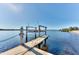 Concrete dock with lift and water access at 3662 Peace River Dr, Punta Gorda, FL 33983