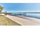 Private dock with seating area and umbrella at 3662 Peace River Dr, Punta Gorda, FL 33983