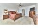 Comfortable main bedroom with ample space and walk-in closet at 3662 Peace River Dr, Punta Gorda, FL 33983