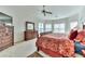 Spacious main bedroom with water views and king-size bed at 3662 Peace River Dr, Punta Gorda, FL 33983