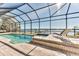 Enclosed pool and spa area with waterfront views at 3662 Peace River Dr, Punta Gorda, FL 33983