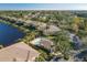 Aerial view of community pool and lakefront location at 3715 45Th W Ter # 108, Bradenton, FL 34210