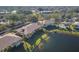 Community overview featuring lakefront homes and pool at 3715 45Th W Ter # 108, Bradenton, FL 34210