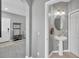 Small powder room with pedestal sink and mirror at 3715 45Th W Ter # 108, Bradenton, FL 34210