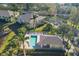 Community pool with lounge chairs and shaded patio at 3715 45Th W Ter # 108, Bradenton, FL 34210