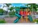 playground with a large slide and climbing structure at 3766 82Nd Avenue E Cir # 106, Sarasota, FL 34243