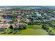 Aerial view showcasing a single home in a tranquil waterfront community at 3803 Wilshire W Cir # 37, Sarasota, FL 34238