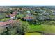 Aerial view showcasing home's location in a waterfront community at 3803 Wilshire W Cir # 37, Sarasota, FL 34238