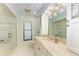 Elegant bathroom with granite countertop and glass shower at 3803 Wilshire W Cir # 37, Sarasota, FL 34238