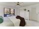 Spacious bedroom with lake view and ceiling fan at 3803 Wilshire W Cir # 37, Sarasota, FL 34238