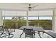 Balcony with outdoor furniture and scenic waterway views at 385 N Point Rd # 402, Osprey, FL 34229