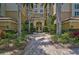 Courtyard with fountain and lush landscaping at 385 N Point Rd # 402, Osprey, FL 34229